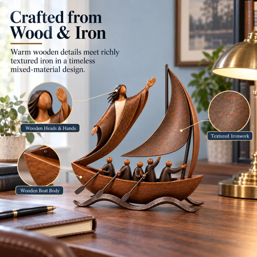 Wood and iron details of faith sailboat sculpture