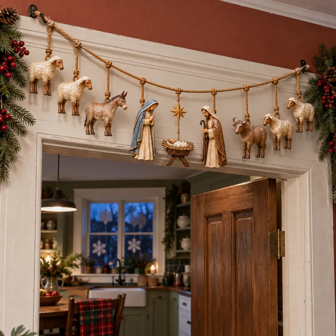 Nativity garland displayed above an interior doorway